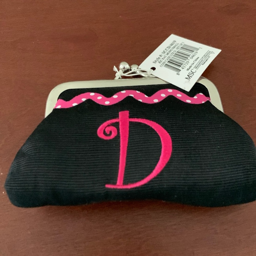 Monogram “D” coin purse; never used